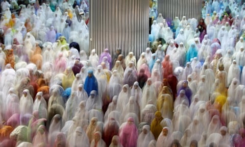 Muslims attend the Ramadan tarawih prayer at Istiqlal mosque in Jakarta, Indonesia.