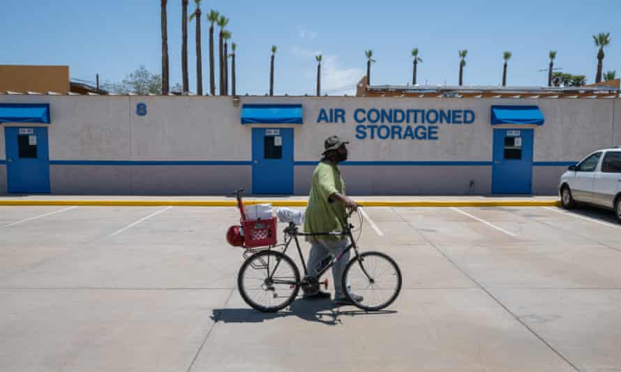 David Spell, 50, on 10 June, as temperatures reached 112F, in Phoenix, Arizona.