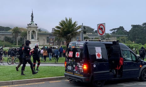 Protesters walk towards the statue of Francis Scott Key at the Golden Gate Park in San Francisco, California, on Friday, in this picture obtained from social media.