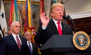 Donald Trump speaks alongside Vice President Mike Pence and Secretary of Defense Jim Mattis, earlier in December.