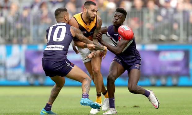 Fremantle Dockers Michael Walters and Michael Frederick were subjected to racial abuse after their Naidoc Week game in July.