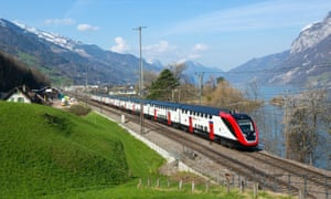 One of Swiss Federal Railwaysâ new long-distance double-decker trains en route to Mols.