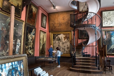 Ornate spiral stairs in an old art gallery