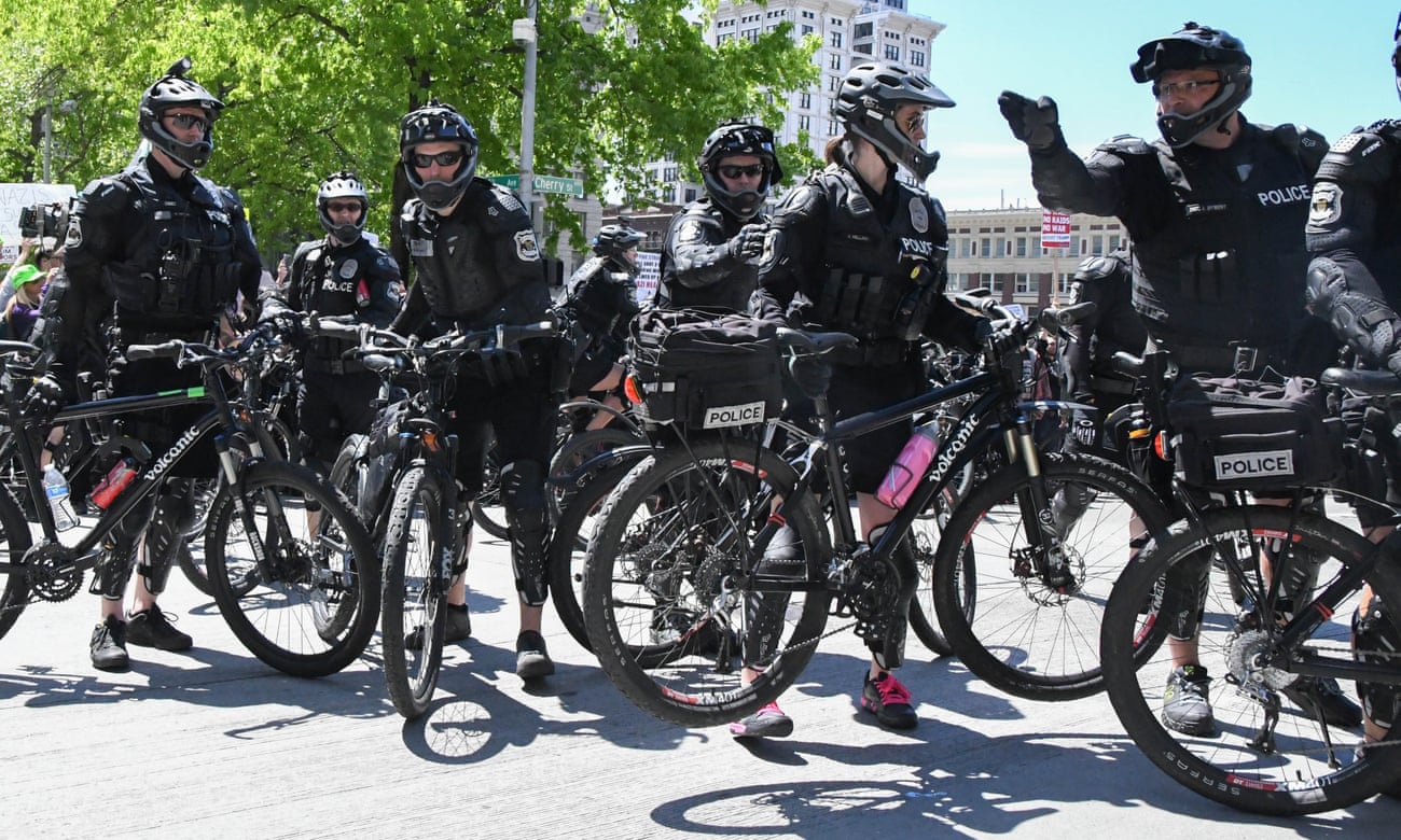 Sgt Jim Dyment (R) directs Seattle’s bike squad