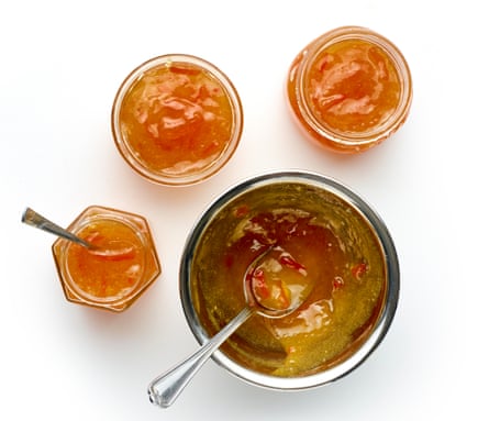 Cool for a moment, then spoon the marmalade into sterilised jars while it’s still hot.