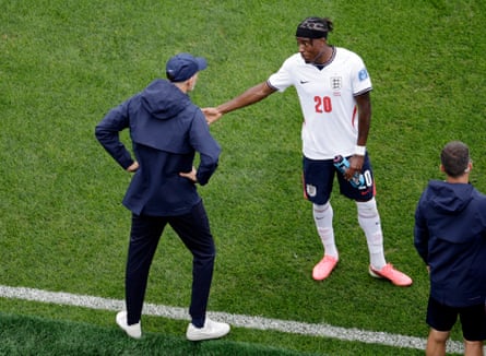 England caput coach Thomas Tuchel and Noni Madueke successful speech connected nan touchline
