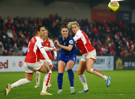 Alessia Russo and Lotte Wubben-Moy (left) try to snuff out danger against West Ham.