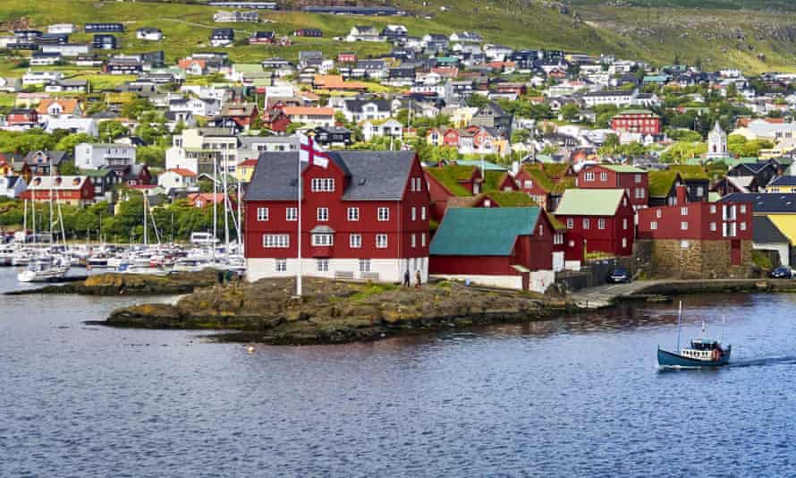 Port of Tórshavn. Even in the capital, many of the houses have the traditional grass roofs of the islands.