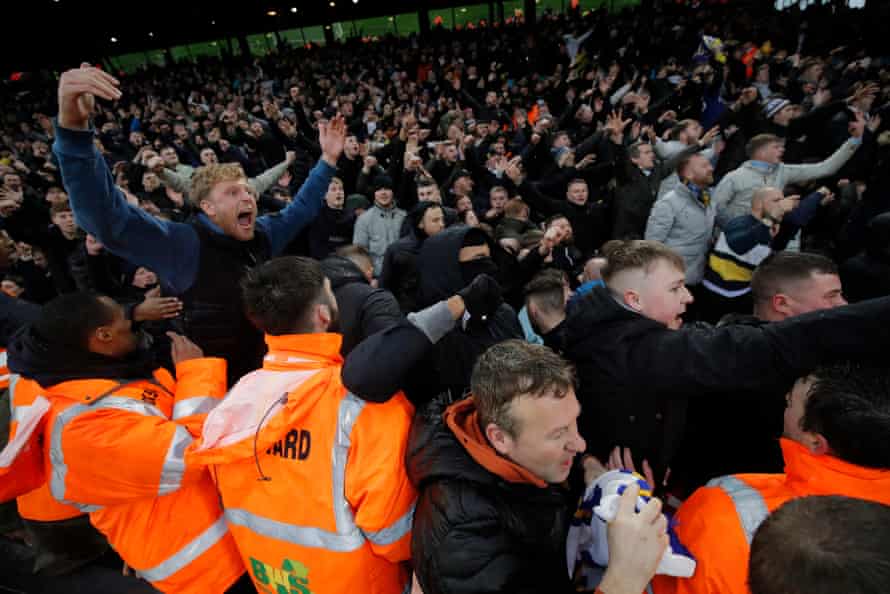 Leeds fans celebrate as their side score twice in two minutes.