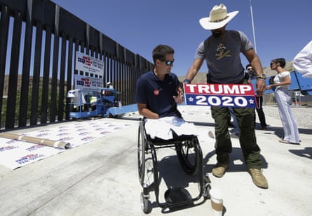 Brian Kolfage, left, and David Clarke Jr, a We Build the Wall board member, prepare for a news conference in Sunland Park, New Mexico.