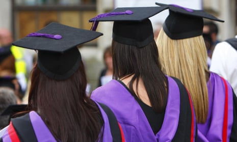 Stock photo of three women graduating from university