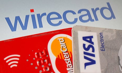 Mastercard and Visa credit cards in front of Wirecard logo