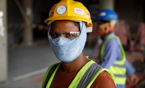 A migrant worker at the construction site for the al-Rayyan stadium.