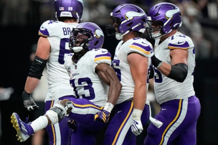 Vikings running back Aaron Jones Sr is congratulated by teammates after scoring a touchdown during SundayâÂÂs 23-13 victory over the Saints in New Orleans.