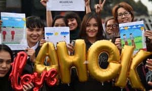 People attend a rally to show support for jailed former governor Basuki Tjahaja Purnama - known by his nickname Ahok.