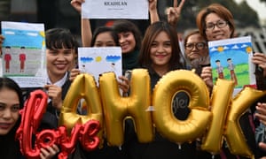 People attend a rally to show support for jailed former governor Basuki Tjahaja Purnama - known by his nickname Ahok. 