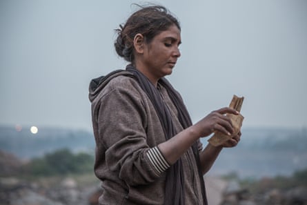 Devi counts her payments after selling coke.