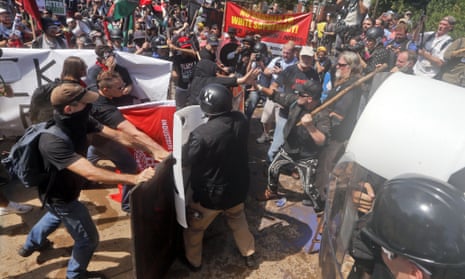 White nationalist demonstrators clash with counter demonstrators at the entrance to Emancipation Park in Charlottesville, Virginia on Saturday 12 August. 