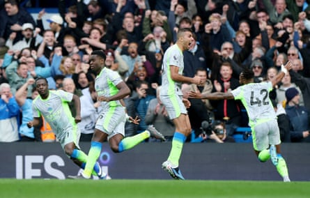 Marc Guehi celebrates at Stamford Bridge.