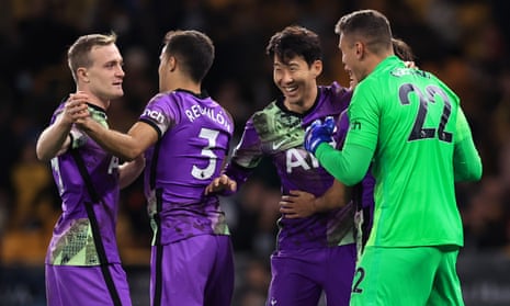 Tottenham players celebrate their penalty shootout win against Wolves in the Carabao Cup.