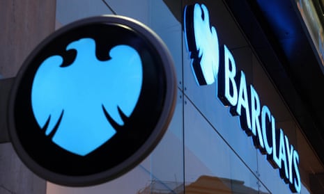 A Barclays bank sign with the eagle logo