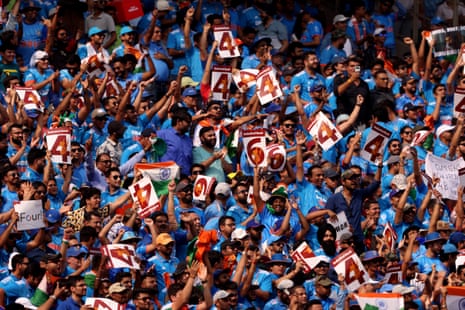 Spectators react in the crowd.