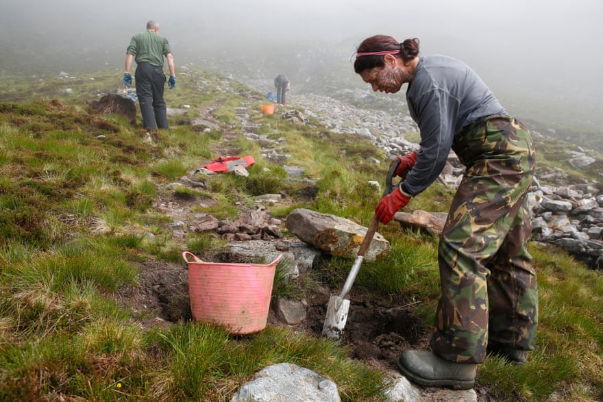 NTS Mountain Path Team at work repairing a path up Mullach an Rathan summit, from Liathach in Torridon