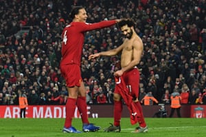 Mohamed Salah celebrates scoring their second goal with Virgil van Dijk.