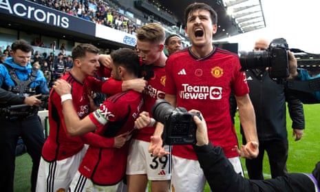 Manchester United’s Bruno Fernandes (second left) celebrates scoring their side’s first goal of the game with Harry Maguire (right) and team-mates.