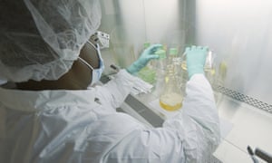 A researcher tests possible COVID-19 antibodies in an Eli Lilly laboratory in Indianapolis