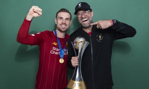BESTPIX: European Best Pictures Of The Day - December 22, 2019<br>DOHA, QATAR - DECEMBER 21: Jordan Henderson and Manager Jurgen Klopp of Liverpool pose with the Club World Cup trophy after the FIFA Club World Cup Qatar 2019 Final match between Liverpool and CR Flamengo at Khalifa International Stadium on December 21, 2019 in Doha, Qatar. (Photo by David Ramos - FIFA/FIFA via Getty Images) BESTPIX