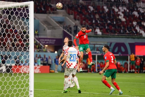 Youssef En-Nesyri of Morocco heads the ball towards goal.