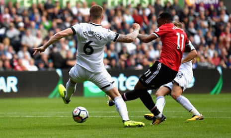 Anthony Martial slots home Manchester United’s fourth goal against Swansea