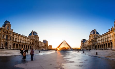 The Louvre Pyramid at sunset, Paris.