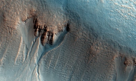The sinuous shape of gullies in the northern wall of an unnamed crater on Mars