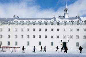 School boys playing broom hockey at recess at Seminary of Québec.