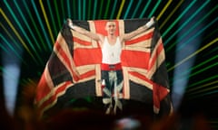 Olly Alexander, representing the UK, poses during the flag parade