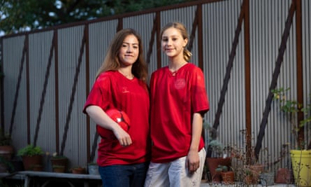 England’s united nations of football: 32 teams, one World Cup – and a lot of excited kids | World Cup 2022 13 Laura and Bess Smart standing in front of a metal fence wearing red Danish World Cup shirts