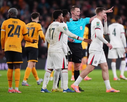 Chelsea’s Liam Delap (right) reacts after being sent off by Jarred Gillett.