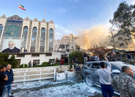 Smoke rises after what the Iranian media said was an Israeli strike on a building close to the Iranian embassy in Damascus, Syria.