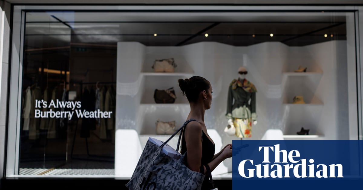 Burberry pays new boss almost 2.6m in nine months while axing jobs