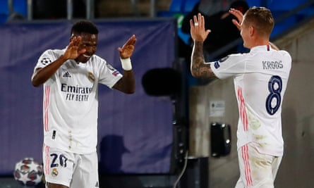 Kroos and Vinícius Júnior celebrate after they combined for Real Madrid’s opening goal.
