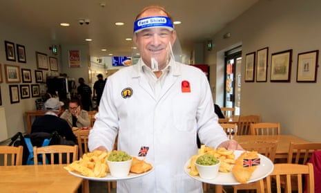 Ed Davey helps out at a fish and chip shop in Stockport during his national ‘listening tour’. 
