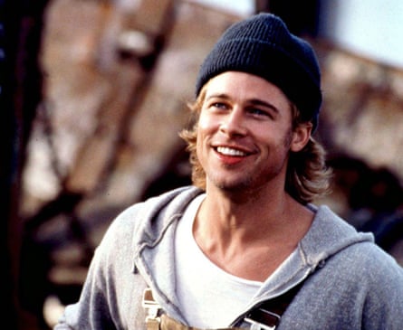 Brad Pitt looking fabulous with shaggy hair and a woollen hat