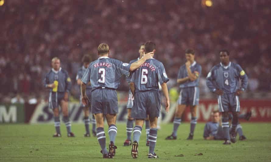 Stuart Pearce (left) consoles teammate Gareth Southgate, now the England manager, after he missed a penalty against Germany in the semi-final at Euro 96.