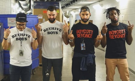 The Beyoncé crew wearing Boycott Beyoncé merchandise.