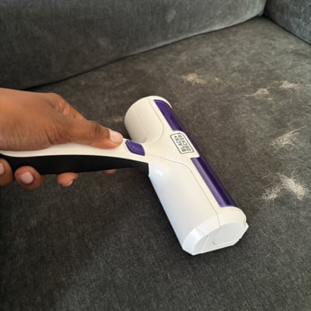 A Black & Decker Pet Hair Remover removing cat hair