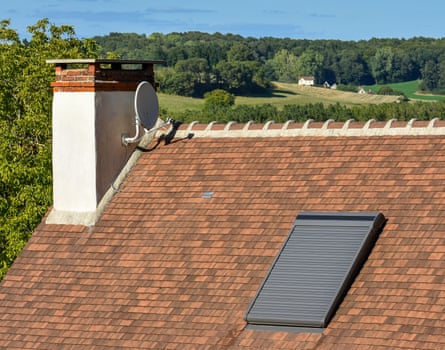 A Velux roof window with the blind closed.