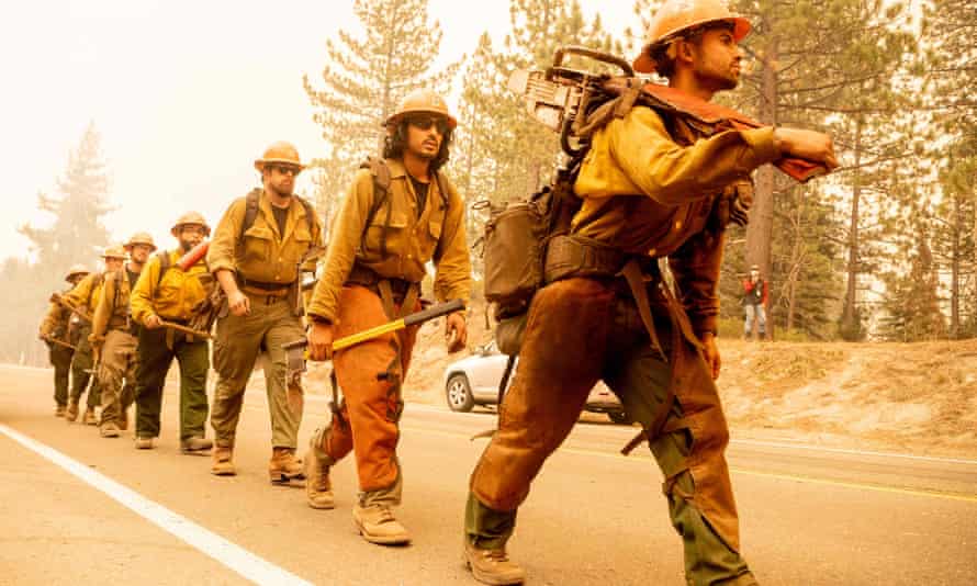A US Forest Service firefighter crew arrives to battle the Caldor in Meyers, California, in August.