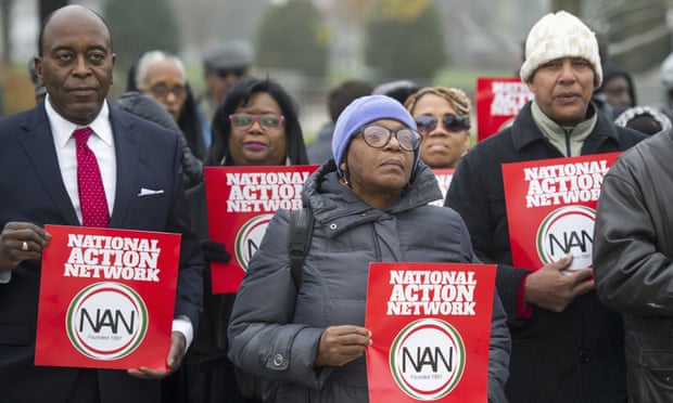 Members of the National Action Network demonstrate outside the supreme court as it heard oral arguments in Fisher v University of Texas at Austin.